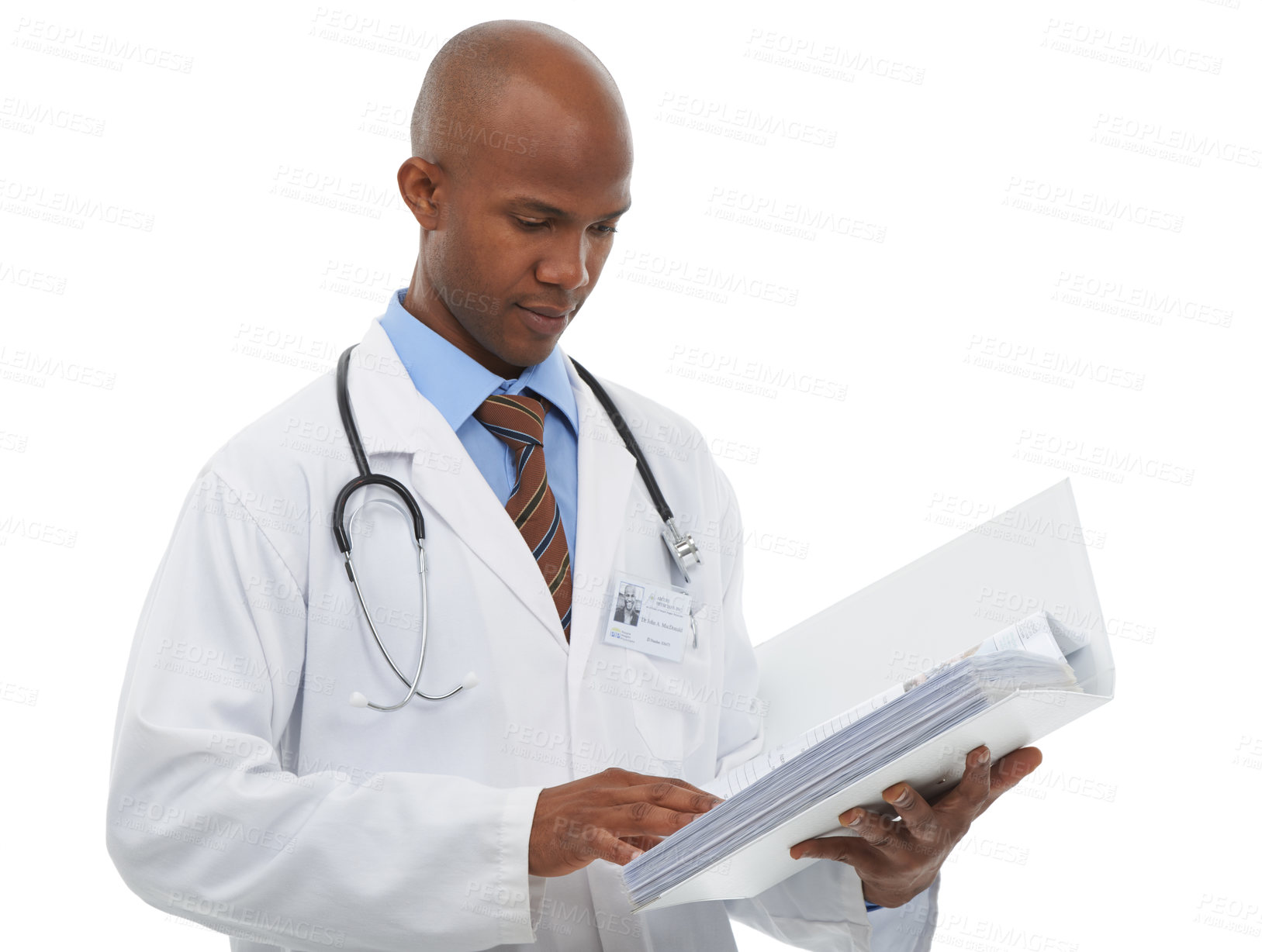 Buy stock photo A young doctor looking over your medical paperwork