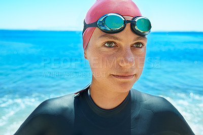 Buy stock photo Swimmer sport, face and woman at sea outdoor in summer for exercise, training or workout. Ocean, athlete and person in goggles in nature for fitness, health or triathlon competition at beach water