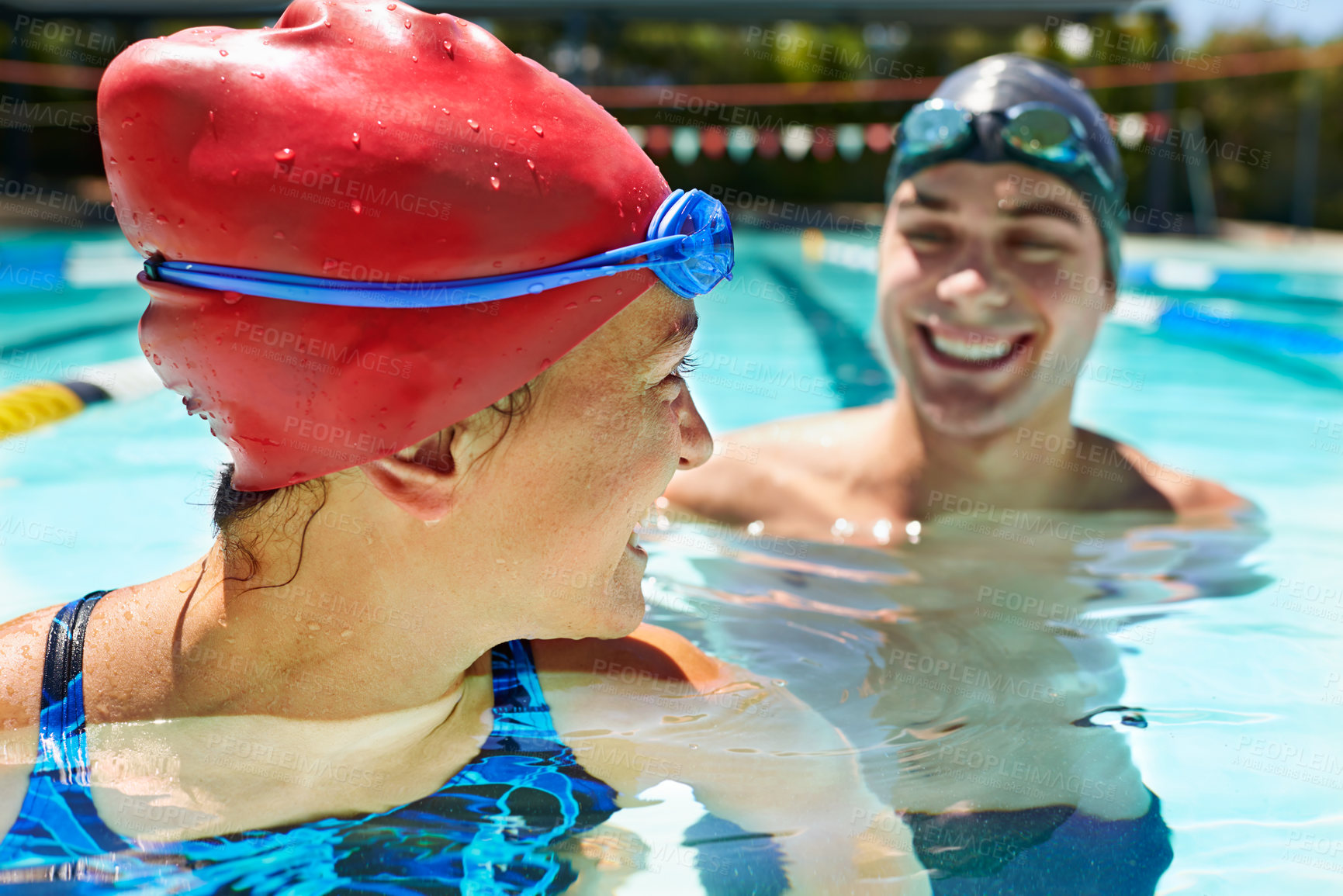 Buy stock photo Laughing, relax or happy couple in swimming pool for sports training, workout or teamwork for fitness. Cardio, swimmers or athletes in exercise for support, health or wellness with smile in water