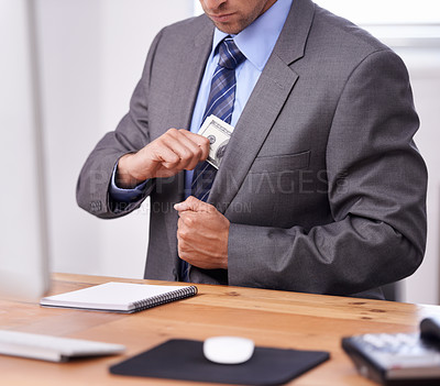 Buy stock photo Business man, money laundering and pocket for corporate crime, stealing or fraud in accounting at his office desk. Person or criminal hands hiding cash for investment secret, bribery and corruption
