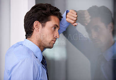 Buy stock photo Stress, depression and businessman with head on wall for crisis, burnout and anxiety for fail by glass. Reflection, frustrated and tired professional in bankruptcy, debt and worry for office mistake