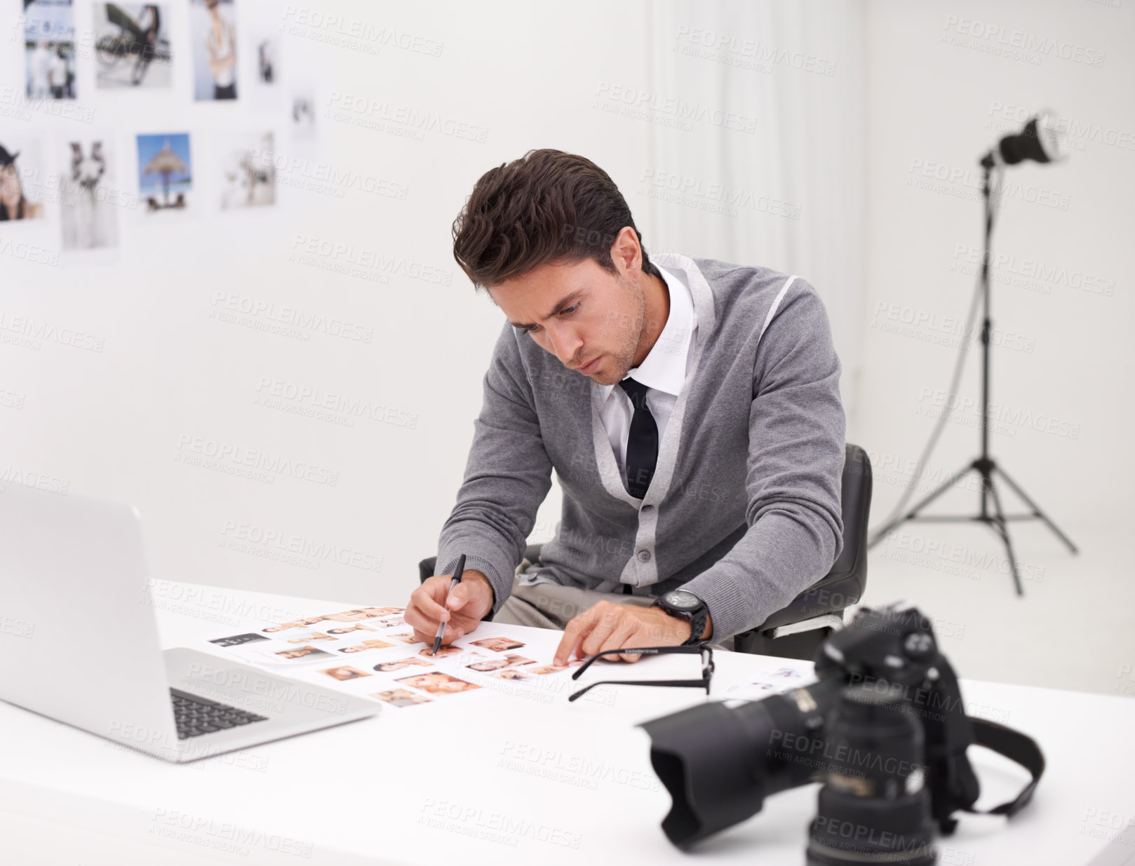 Buy stock photo Photographer, thinking and man editing in office with computer to process, production and catelog images. Professional, editor and creative person with laptop and photoshoot results of cinematography
