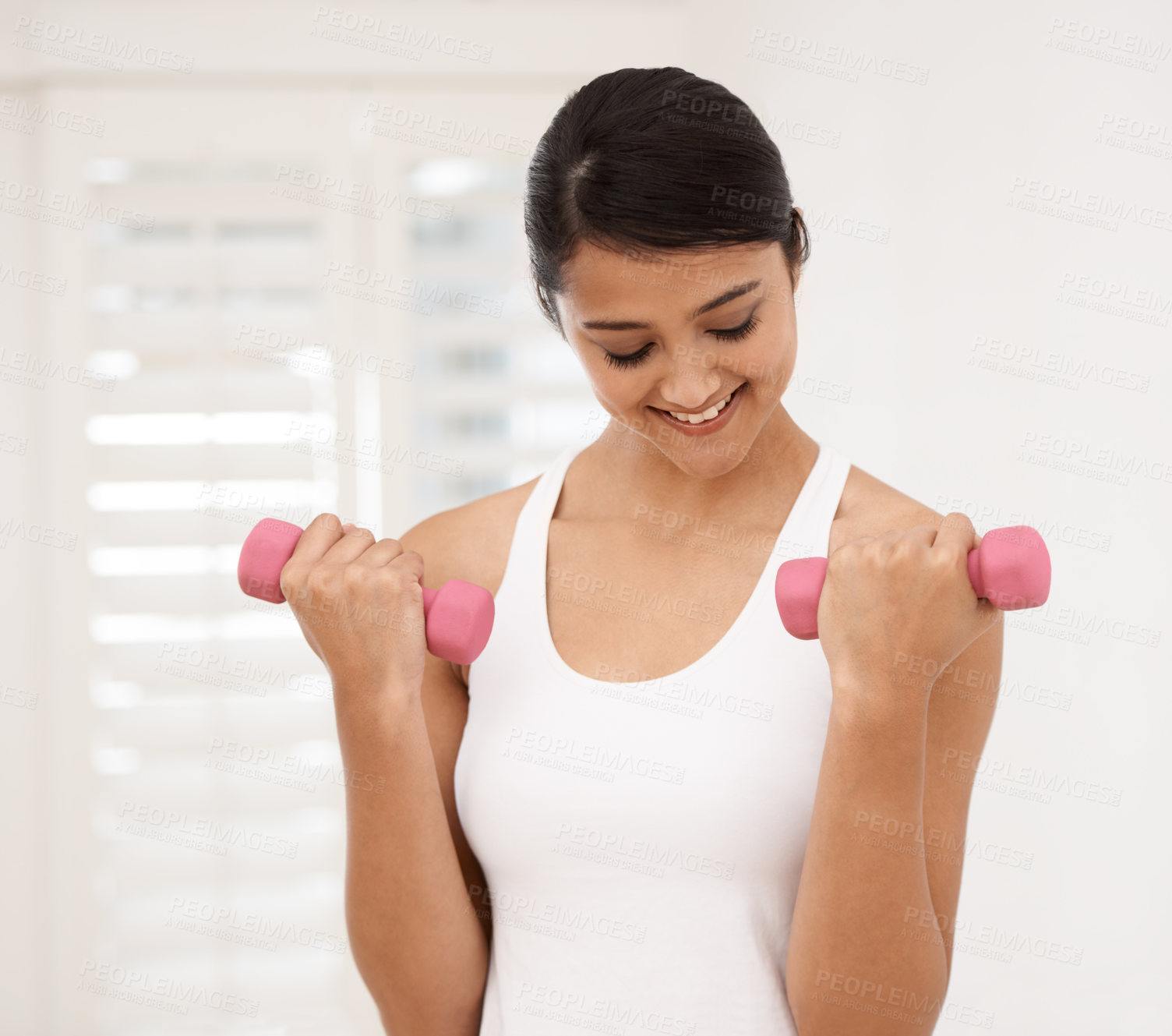 Buy stock photo Woman, dumbbells for weightlifting and fitness, muscle training and strength with workout in apartment. Exercise, smile and weights, strong for health and routine physical activity in home gym