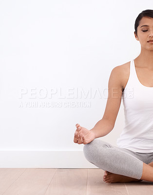Buy stock photo Woman, meditation and spiritual in a home with mockup space and yoga for balance and mindfulness. Morning, wellness and zen in house on floor to relax for calm breathing and peace in lotus position