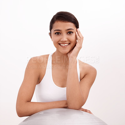 Buy stock photo Studio, portrait and happy woman with gym ball, smile and exercise for health, wellness and training. Workout, pilates and girl with equipment for balance, fitness and body care on white background.