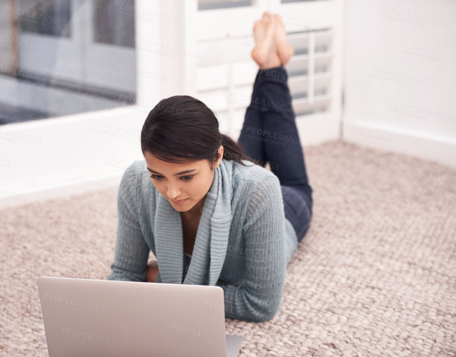 Buy stock photo Woman on carpet with laptop, search and relax with studying, college research and browse on web in living room. University student girl on floor with computer, elearning and online education in home.