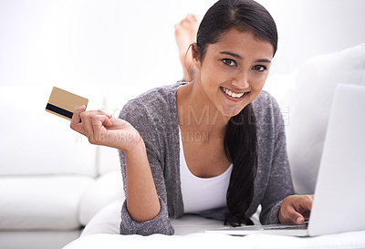 Buy stock photo Happy woman, portrait and credit card with laptop for online shopping, purchase or payment on sofa at home. Young female person smile with debit in relax on computer for ecommerce, fintech or banking