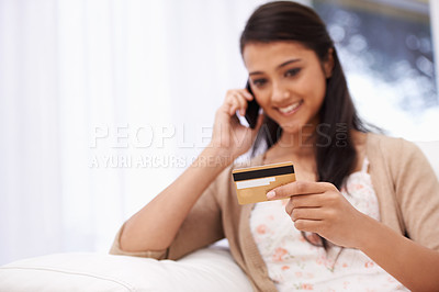 Buy stock photo Happy woman, phone call and credit card for banking, online shopping or payment on sofa at home. Female person talking on mobile smartphone with smile for ecommerce, debit or conversation on account