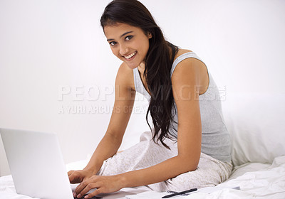 Buy stock photo Portrait, home and woman with a laptop, bedroom and typing with internet, technology and connection. Face, person and girl with network, relax and website information with copywriter and digital app