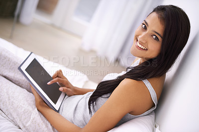 Buy stock photo Portrait, tablet and woman with a smile, screen and relax with online news, internet and connection. Home, person or girl with technology, apartment and website info with social media and digital app