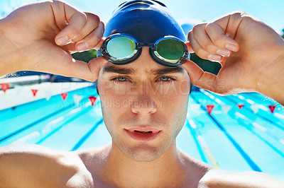 Buy stock photo Man, swimming pool and prepare in portrait with goggles, cap or sport with exercise for wellness, health or fitness. Swimmer, athlete or person by water for race, contest and closeup at summer games