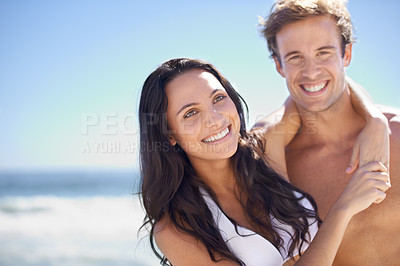 Buy stock photo Portrait, hug and happy couple on beach for holiday adventure together on tropical island with sky. Smile, man and woman on ocean vacation with waves, embrace and mockup on romantic travel in Bali.