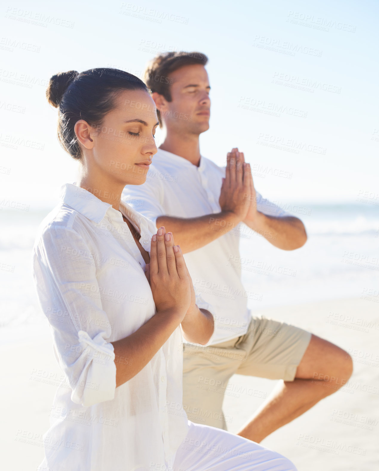 Buy stock photo Yoga, meditation and travel with couple on beach together for wellness, zen or holistic exercise. Summer, awareness or mindfulness with young man and woman by sea or ocean for balance and inner peace