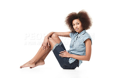 Buy stock photo African woman, fashion and portrait on a studio floor with casual style and sitting. Isolated, white background and young female person with body confidence and modern jeans clothes on the ground