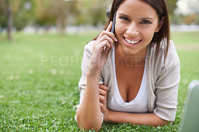 Buy stock photo Woman, portrait and phone call or talking on grass for connection, conversation or advice. Female person, face and digital device in nature or speaking for exciting news, information or discussion