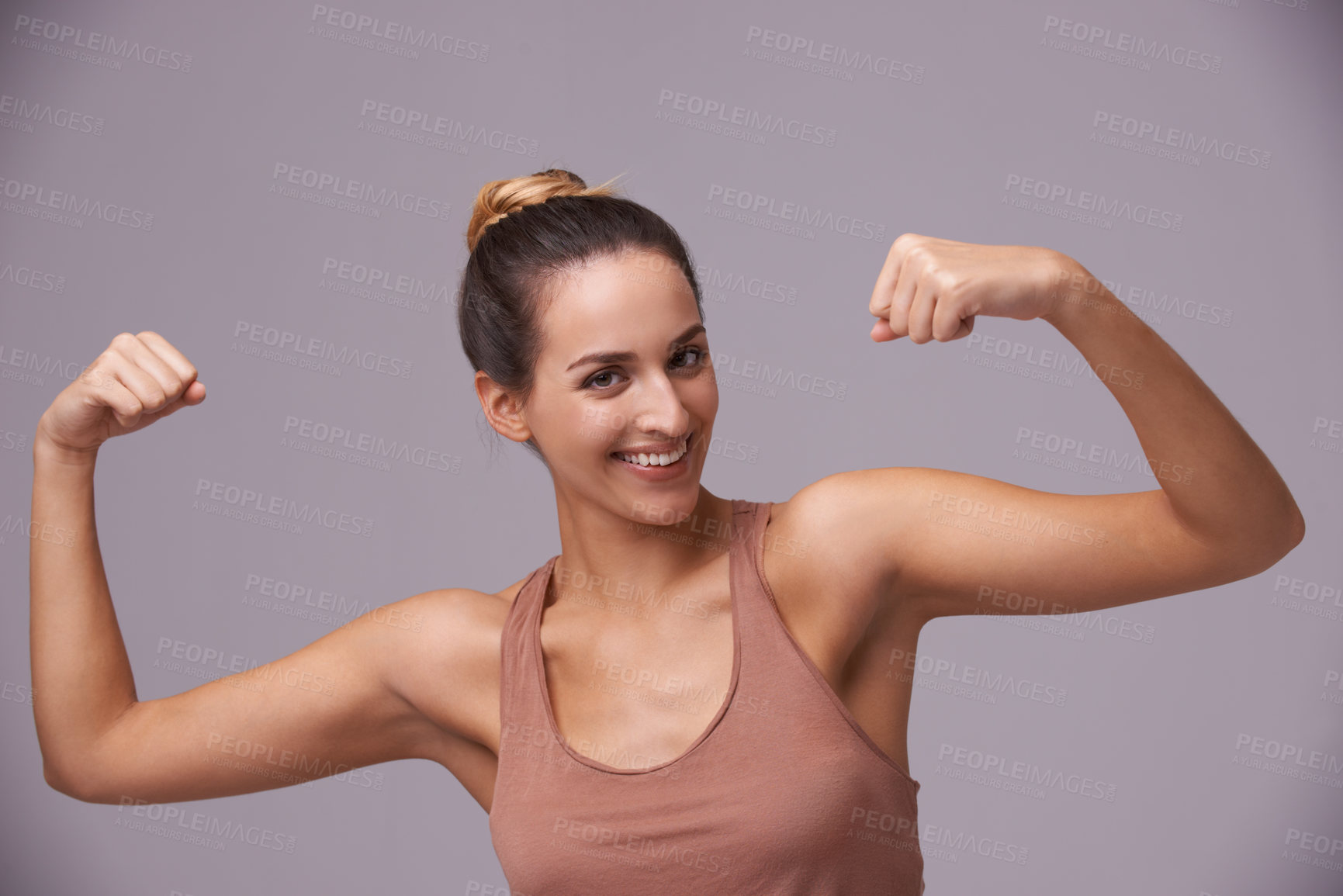 Buy stock photo An attractive young woman against a purple background