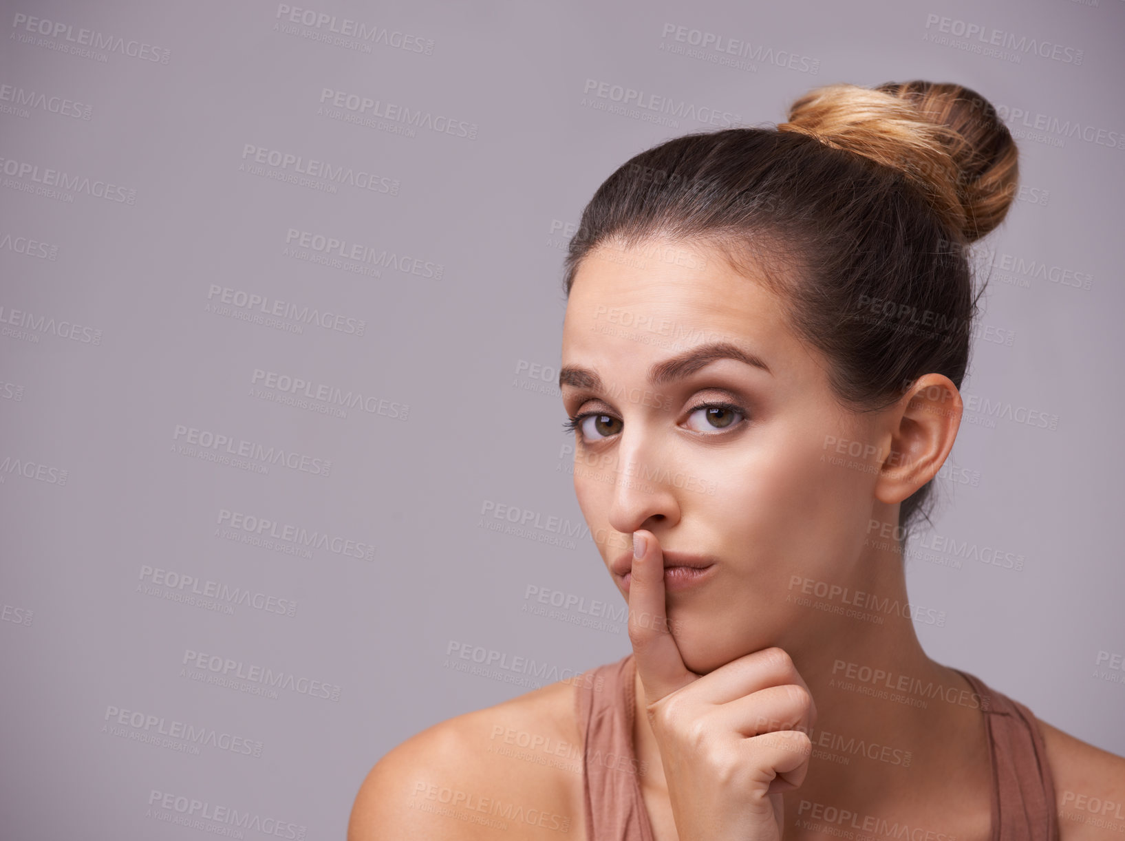 Buy stock photo Portrait of woman, finger on lips or silence for secret, mystery or privacy in gossip on grey background. Mouth, natural face or confident model isolated in studio with beauty for skincare or hush