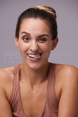 Buy stock photo Portrait, funny and woman with a smile, emoji and expression on a white studio background. Face, person and model with reaction, tongue out and cheerful with emotion, reaction and goofy with humor