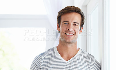 Buy stock photo Man, portrait and smile confidence in home or relax weekend, morning or holiday. Male person, face and casual in apartment living room in summer in good mood or calm positivity, rest or stress relief
