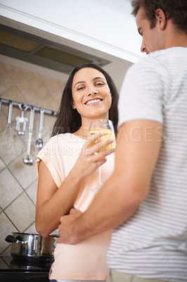 Buy stock photo Couple, hug and alcohol for cooking in portrait, healthy meal and preparing food for eating at home. Happy people, love and bonding together in marriage, nutrition and embrace for support in kitchen