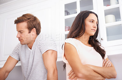 Buy stock photo Couple, fight and angry with conflict or crisis in life, mistake or marriage fail with anxiety and stress at home. Frustrated people arguing in kitchen, cheating or problem with risk of divorce