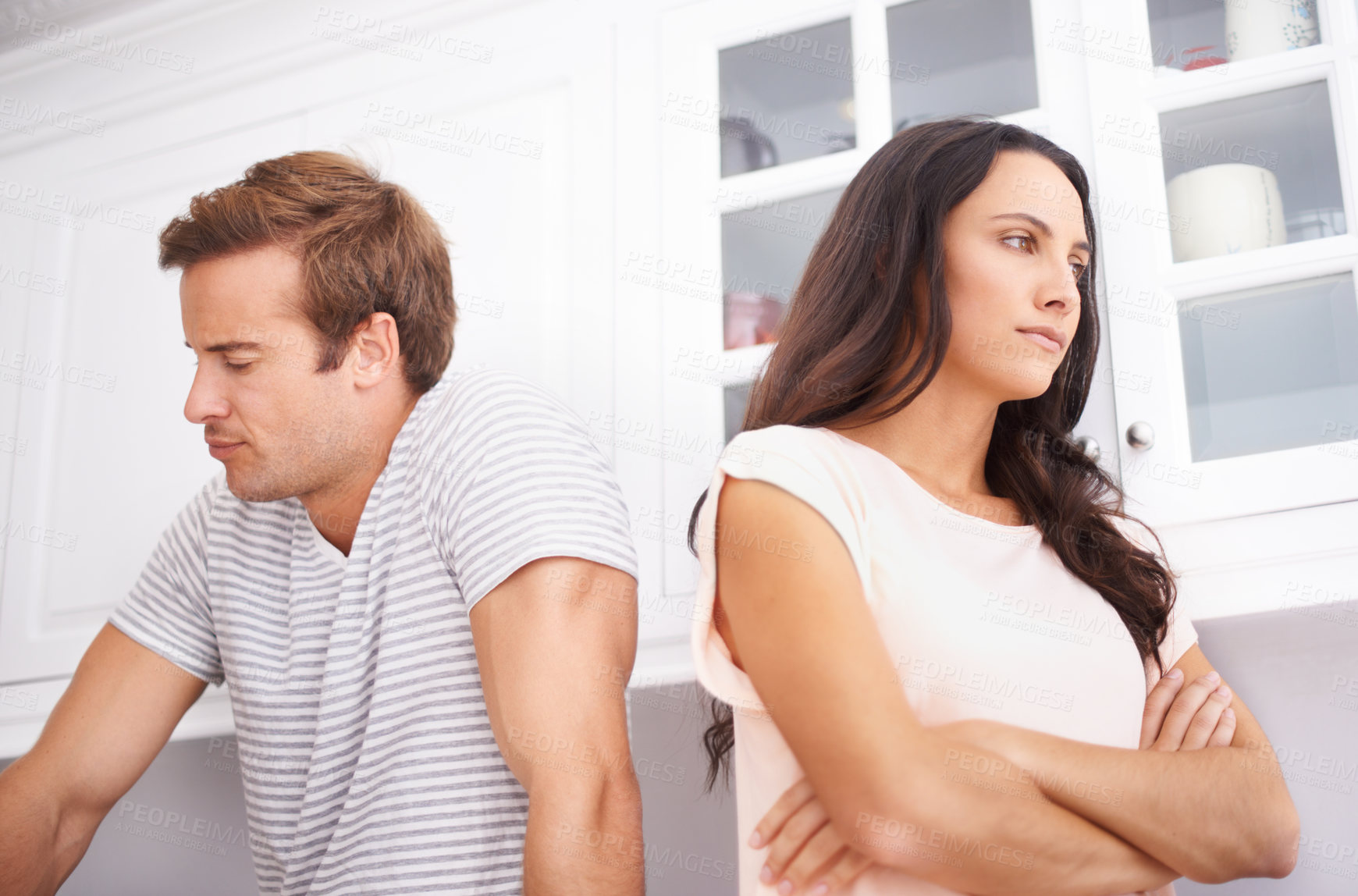 Buy stock photo Couple, fight and angry with conflict or crisis in life, mistake or marriage fail with anxiety and stress at home. Frustrated people arguing in kitchen, cheating or problem with risk of divorce