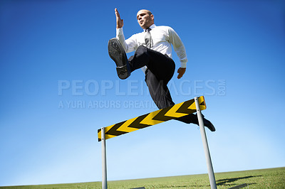 Buy stock photo Businessman, hurdle and jumping for career obstacle or competition or employee challenge, growth or achievement. Male person, leap and work professional goals for overcome, job development or mockup