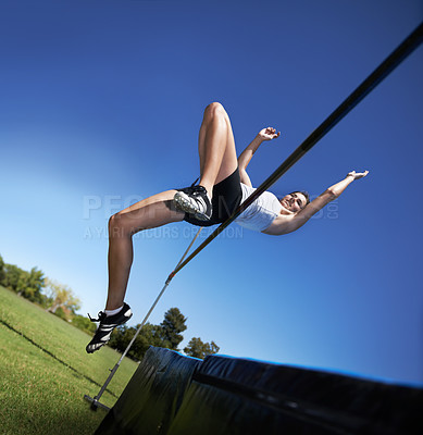Buy stock photo Woman, sports and high jump athlete for training outdoor for competition health, endurance or practice. Female person, leap and agility for cardio exercise or contest fitness, blue sky or flexible