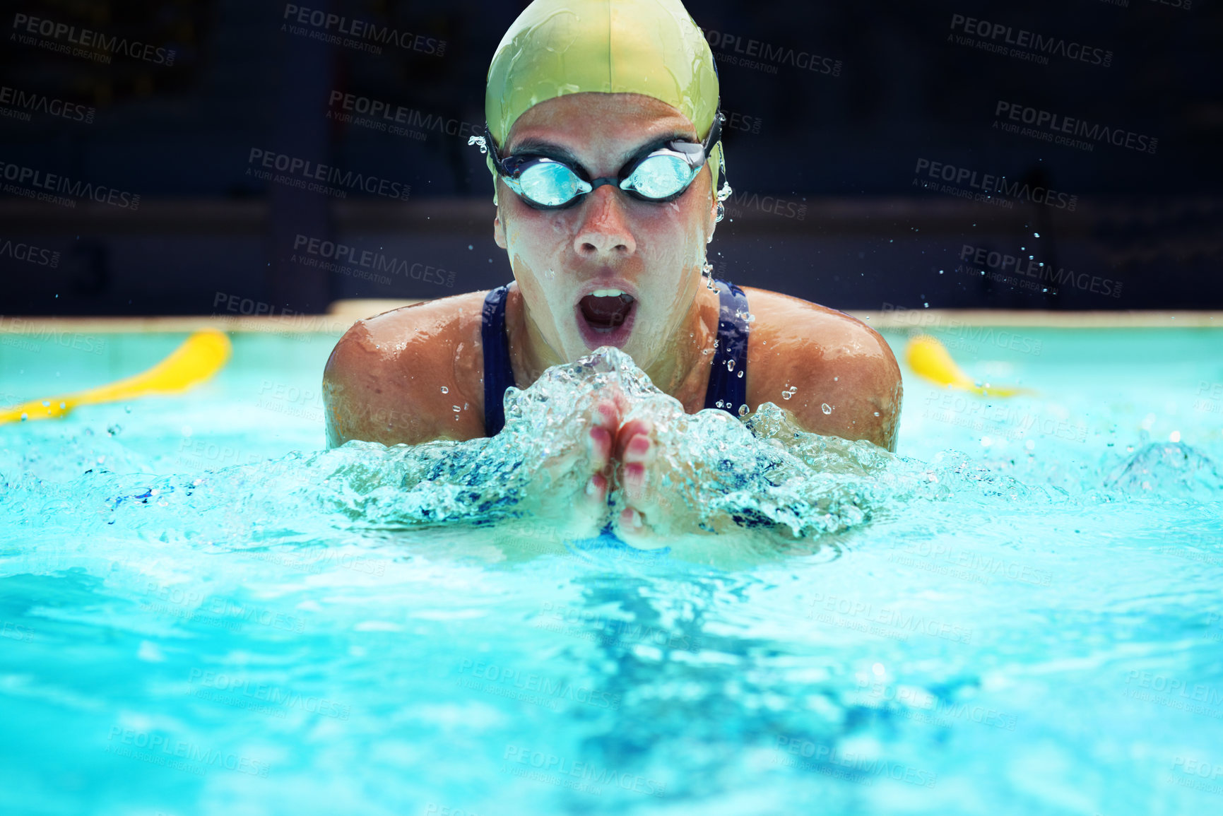 Buy stock photo Swimming, sport and athlete breathe in pool, competition or cardio training for triathlon race. Fitness, workout and woman exercise for health, wellness and practice stroke in gym with water splash