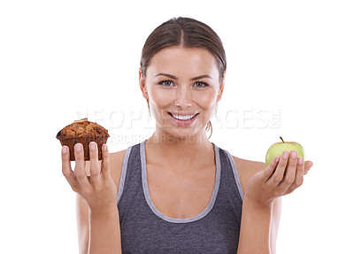 Buy stock photo Woman, portrait and choice of healthy food in hands with apple and muffin in white background of studio. Mockup, space and person balance a decision in nutrition with sweets, dessert and fruit