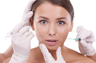 Buy stock photo Plastic surgery, fear and portrait of woman with syringe needle in skin with stress or shock. Cosmetic injection in face for skincare, treatment and person worry about risk in beauty in studio 