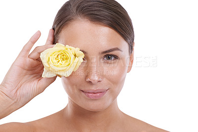 Buy stock photo Woman, rose and portrait with beauty, skincare and confident with close up, flower and female person. Skin, wellness and glowing face with white studio background, model and cosmetic dermatology