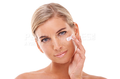 Buy stock photo Cream, portrait or woman with skincare, facial or natural product for grooming treatment on white background. Girl, beautiful or beauty model moisturizing face with marketing mockup space in studio