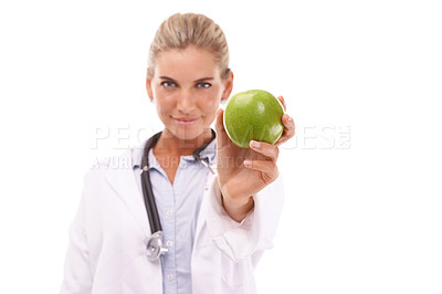 Buy stock photo Doctor, studio portrait and woman with apple for nutrition, wellness and health by white background. Happy isolated nutritionist, fruit and advice for healthcare, natural diet and healthy food