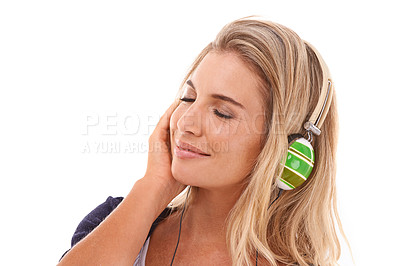 Buy stock photo Music, headphones and studio woman listening to radio, audio podcast or playlist song to relax. Hearing, wellness and happy face of model streaming sound for stress relief on white background