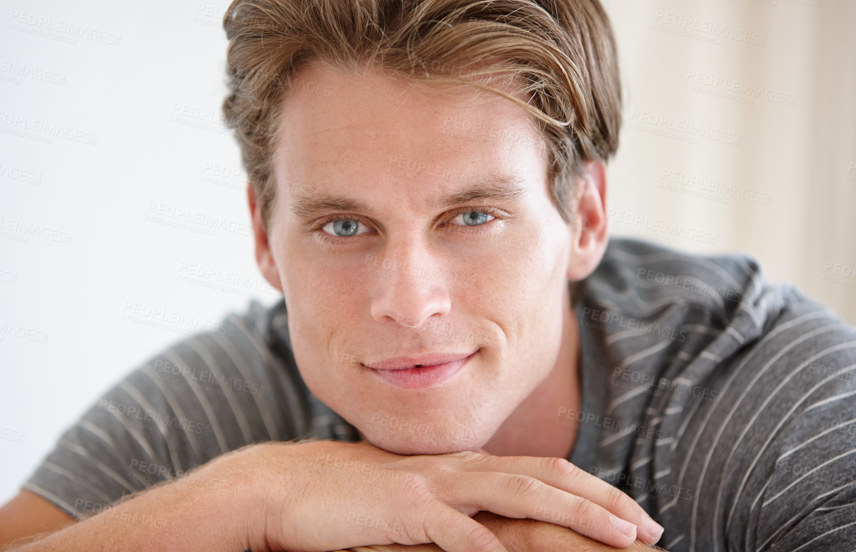 Buy stock photo Portrait of a handsome young man at home