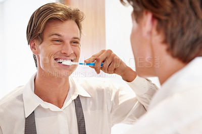 Buy stock photo Dental, bathroom mirror and business man brushing teeth in a house for hygiene, wellness or morning routine. Oral, cleaning and male entrepreneur with toothbrush for mouth, gums or fresh breath