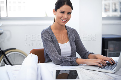 Buy stock photo Woman, computer and floor plan in office portrait for architecture research, design planning and startup project. Young engineering worker or designer typing on laptop with blueprint and documents