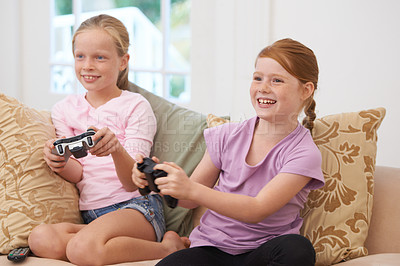Buy stock photo Home, controller or happy kids gaming to play online with joystick on couch or sofa in living room. Children, fun experience or young girl gamers with smile for video games, contest or technology