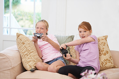 Buy stock photo Challenge, controller or happy kids gaming to play online with joystick on couch or sofa in living room. Children, young or funny girl gamers with smile for video games, contest or experience in home