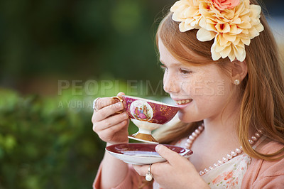 Buy stock photo Girl, child and smile with tea in garden with party for birthday, celebration and playing outdoor in home. Person, kid and porcelain cup in backyard of house with dress up, beverage and role play fun