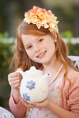 Buy stock photo Girl, child and tea or happy in garden with party for birthday, celebration and playing outdoor in home. Person, portrait and face in backyard of house with dress up, beverage and role play fun