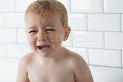 Buy stock photo Sad, crying and baby boy at home, unhappy and distress and naughty childhood personality. Problem, emotional and frustrated young kid, bathroom and toddler with development, wet and vulnerable