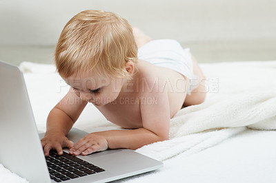 Buy stock photo Baby, learning and playing on laptop in home with online games for education or elearning. Happy, child and relax with cartoon, movies or development of knowledge of technology for growth and fun