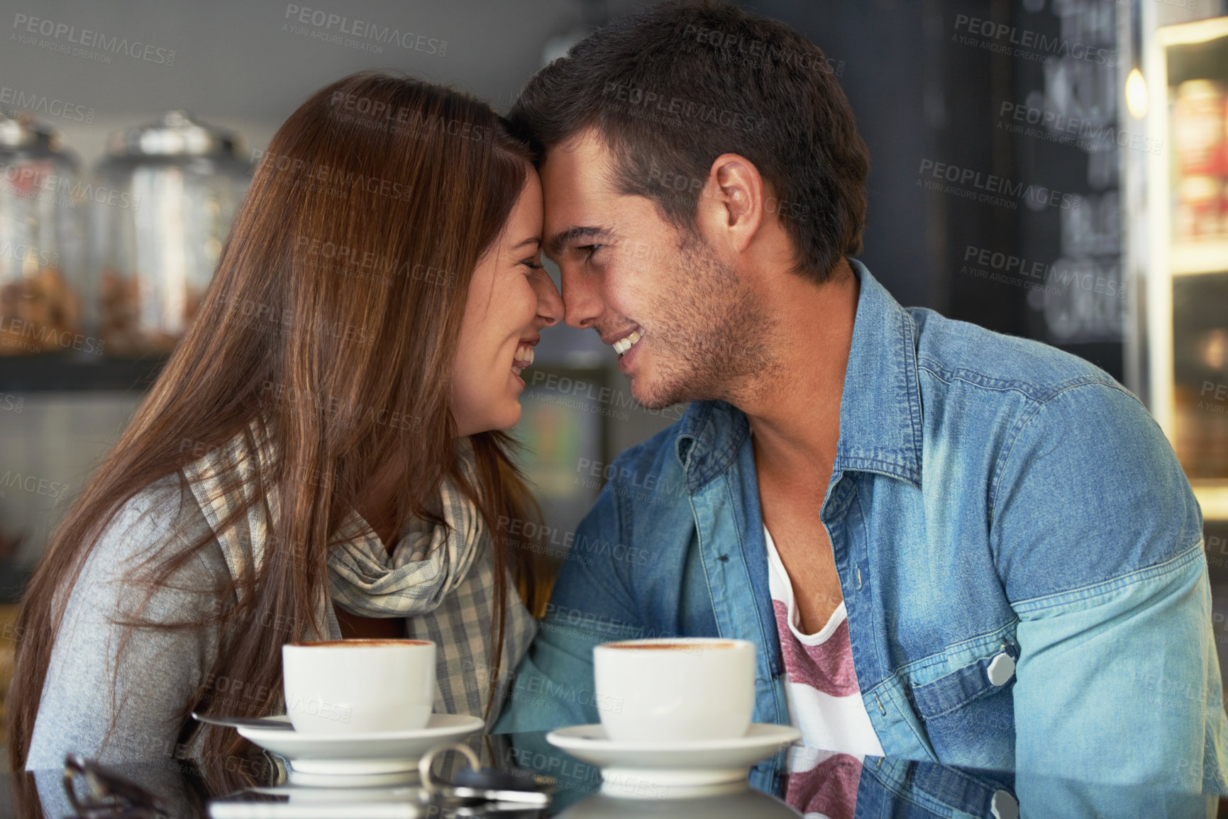 Buy stock photo Love, forehead touch and happy couple in cafe, care and bonding together on valentines day date. Romance, man and woman in restaurant with coffee for connection, commitment and relationship in shop