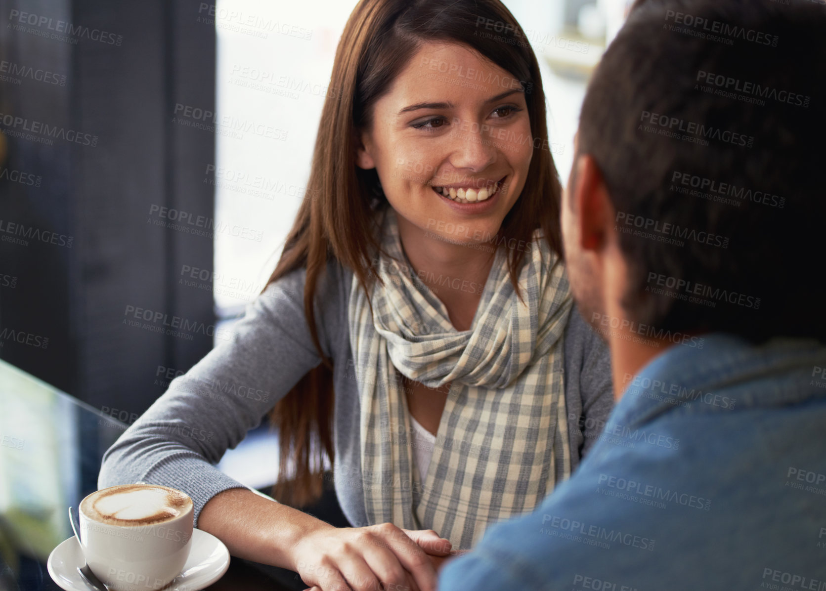 Buy stock photo Love, smile and a couple in cafe, drinking coffee and bonding together on valentines day date. Happy man, woman in restaurant and latte for conversation, romantic connection and relationship in shop