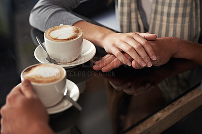 Buy stock photo Coffee cup, cafe and relax couple holding hands for support, empathy and care on morning date with caffeine beverage. Relationship, hospitality service and closeup of people bonding over drink mug