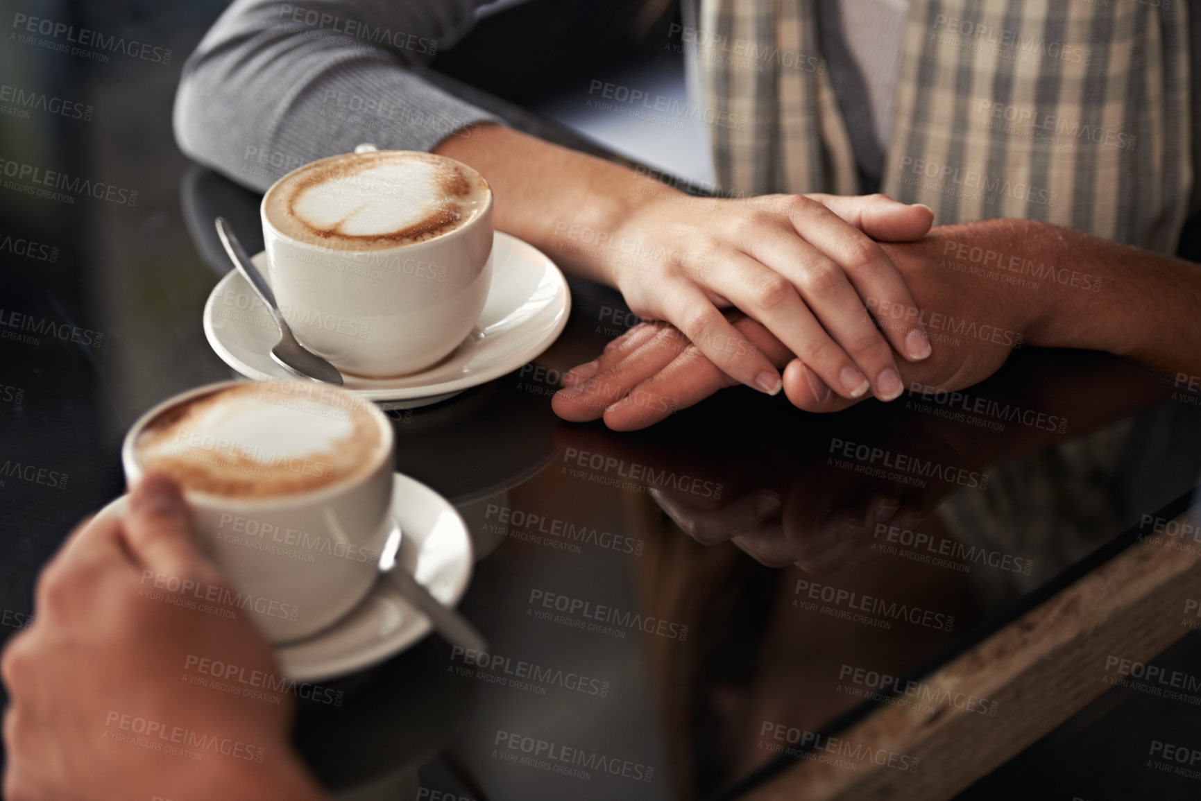 Buy stock photo Coffee cup, cafe and relax couple holding hands for support, empathy and care on morning date with caffeine beverage. Relationship, hospitality service and closeup of people bonding over drink mug