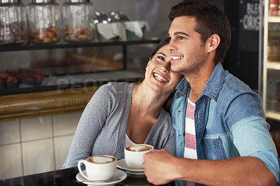 Buy stock photo Love, happy couple and drinking coffee in shop, cafe and bonding together on valentines day date. Smile, man and woman in restaurant with latte for connection, commitment and support in relationship