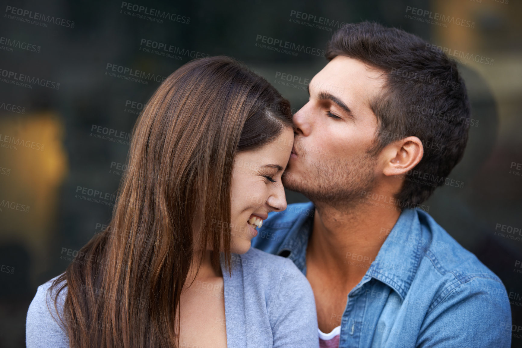 Buy stock photo Love, kiss forehead and a happy couple outdoor for care, commitment and people in connection. Romance, man and woman together for bonding, smile in relationship and affection on valentines day date